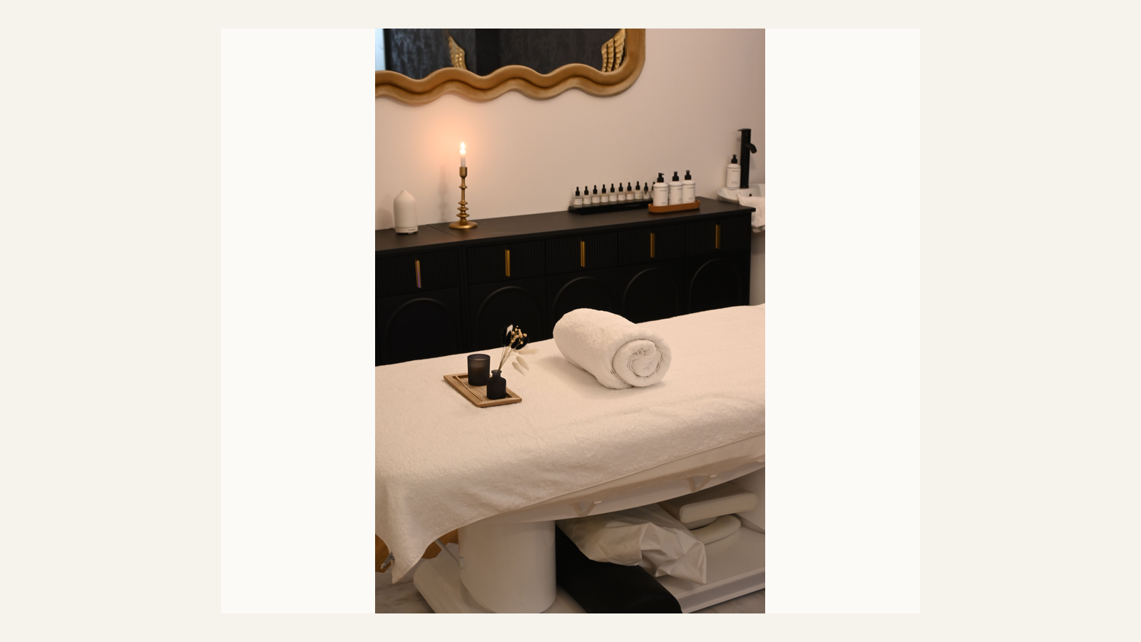 Blys mobile massage review scene with towels appointment notes and a calm London room