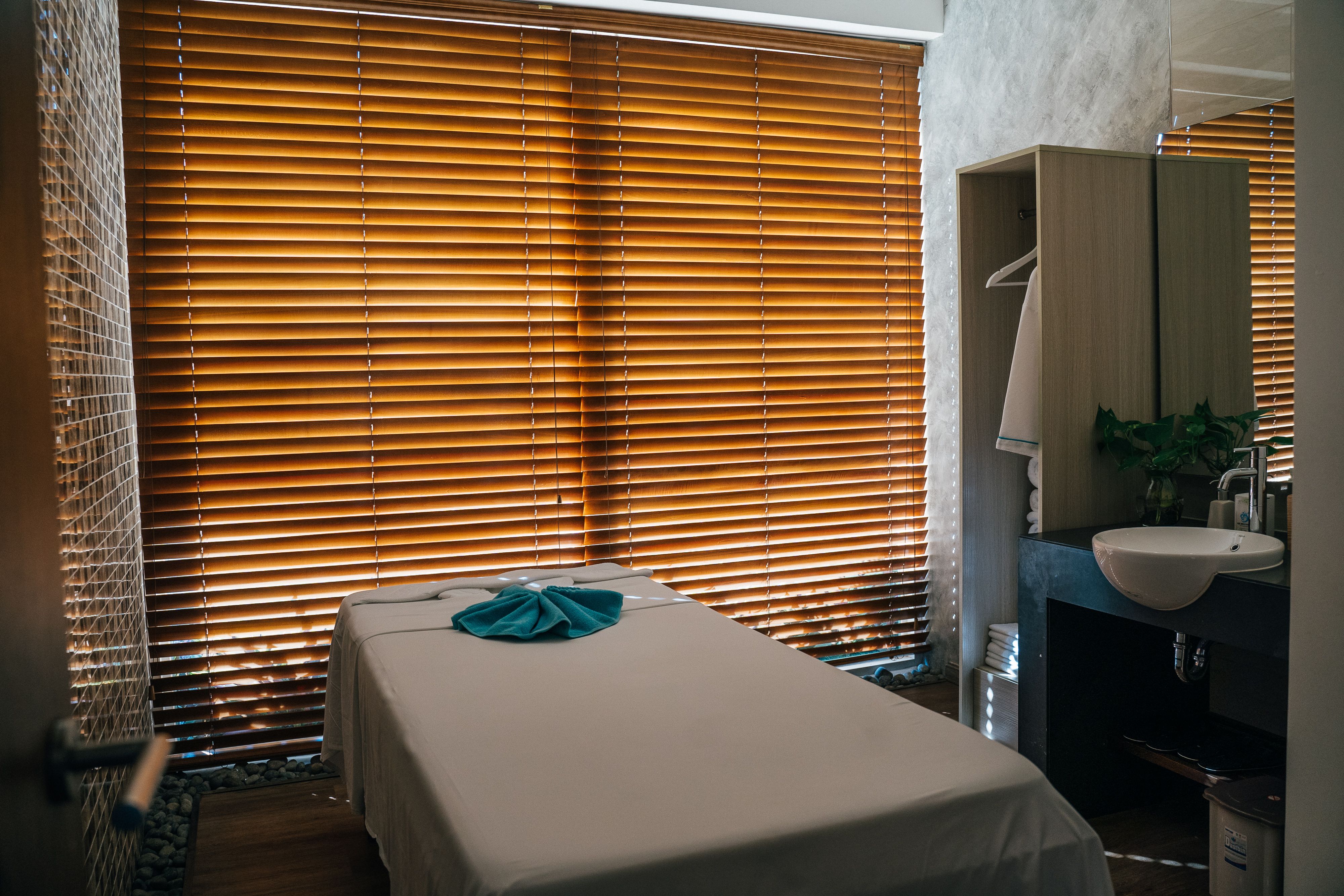 Secret Spa mobile massage review scene with towels appointment notes and a calm London room